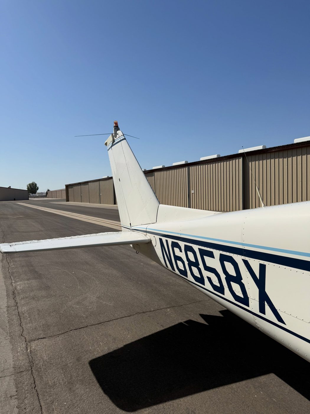 A detailed small plane on a Kern County airstrip