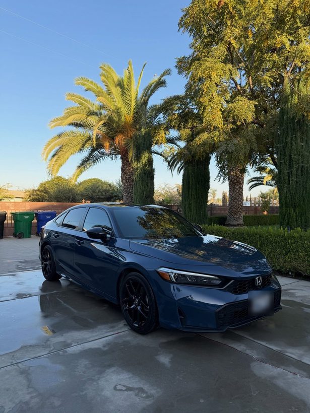 Blue Honda Civic, freshly washed
