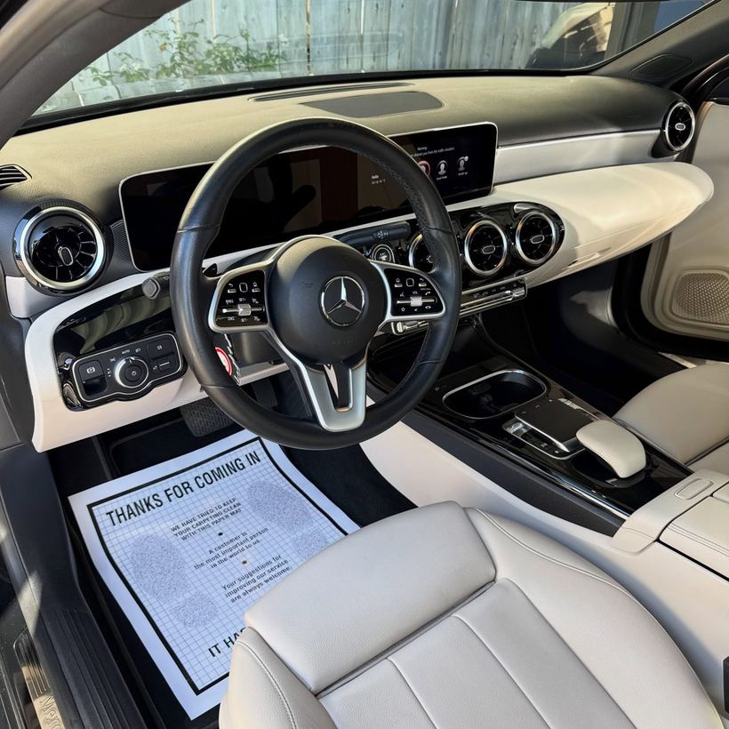 Mercedes interior with light leather after a full detail